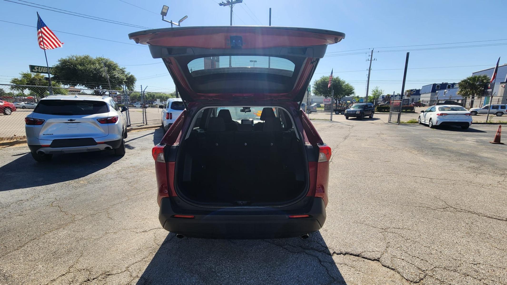 2023 Red Toyota RAV4 LE (2T3H1RFV9PW) with an 2.5L L4 DOHC 16V engine, 8A transmission, located at 1842 Wirt Road, Houston, TX, 77055, (713) 973-3903, 29.805330, -95.484787 - Photo #11
